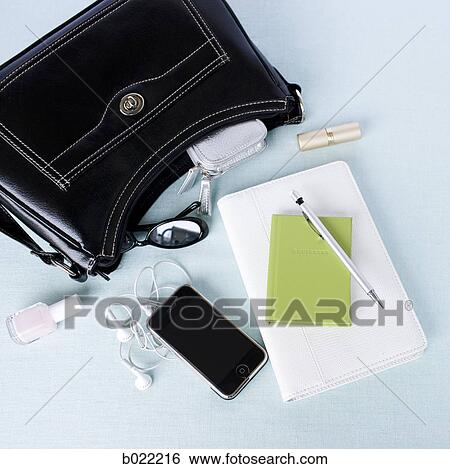 contents of a purse View Large Photo Image Stock Photograph - contents of a purse. Fotosearch