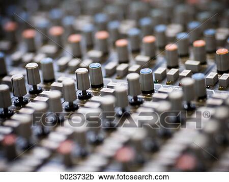 Stock Image - control panel in a recording studio. Fotosearch