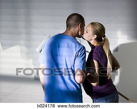 couple painting a room View Large Photo Image Stock Photo - couple painting a room. Fotosearch
