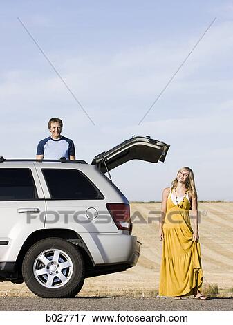 couple pulled over on the side of the road View Large Photo Image Stock Photo - couple pulled over on the side of the road. Fotosearch