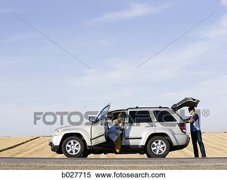 couple pulled over on the side of the road View Large Photo Image Stock Photography - couple pulled over on the side of the road. Fotosearch