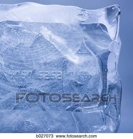 credit card frozen in a solid block of ice View Large Photo Image Stock Image - credit card frozen in a solid block of ice. Fotosearch