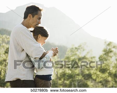 dad camping with his kids View Large Photo Image Stock Image - dad camping with his kids. Fotosearch