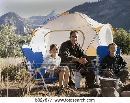 dad camping with his kids View Large Photo Image Stock Photo - dad camping with his kids. Fotosearch