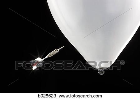 dart popping a balloon View Large Photo Image Stock Image - dart popping a balloon. Fotosearch