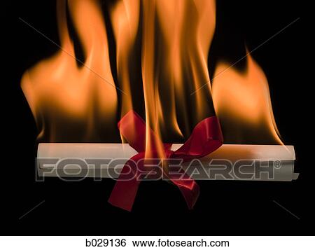 Stock Photograph - diploma on fire. Fotosearch