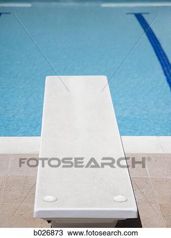 diving board and a swimming pool View Large Photo Image Stock Image - diving board and a swimming pool. Fotosearch