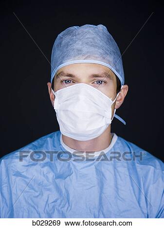 doctor with a surgical mask View Large Photo Image Stock Photo - doctor with a surgical mask. Fotosearch