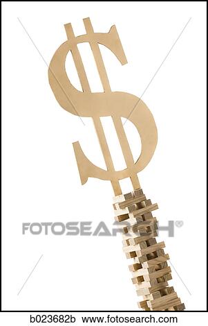 dollar symbol perched on a tower of blocks View Large Photo Image Stock Image - dollar symbol perched on a tower of blocks. Fotosearch