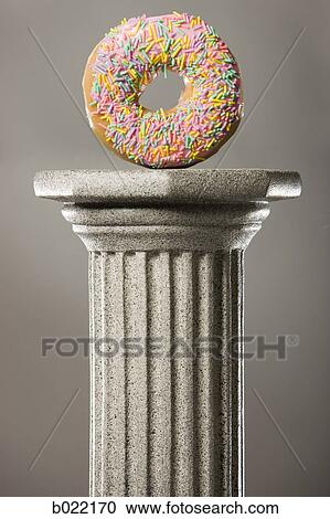 Stock Image - donut on a pedestal. Fotosearch