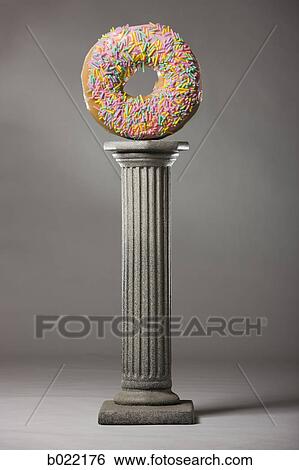 donut on a pedestal View Large Photo Image Stock Photograph - donut on a pedestal. Fotosearch