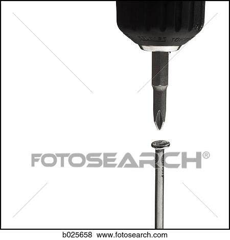 electric drill screwing a nail View Large Photo Image Stock Photo - electric drill screwing a nail. Fotosearch