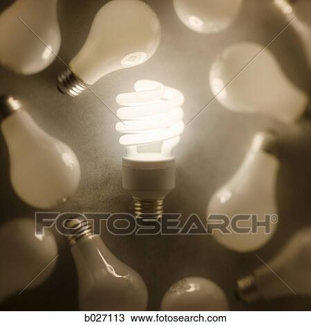 energy efficient light bulb among regular bulbs View Large Photo Image Stock Image - energy efficient light bulb among regular bulbs. Fotosearch