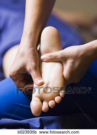 Stock Image - foot massage. Fotosearch