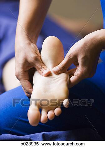 Stock Photography - foot massage. Fotosearch
