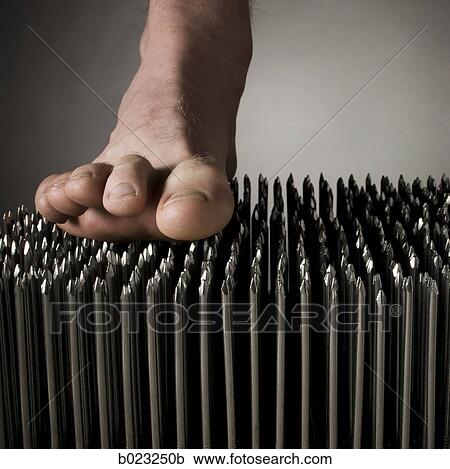 foot walking on nails View Large Photo Image Stock Image - foot walking on nails. Fotosearch