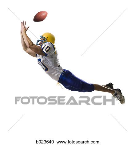 football player catching a pass View Large Photo Image Stock Image - football player catching a pass. Fotosearch