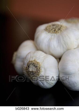 Stock Image - garlic cloves. Fotosearch