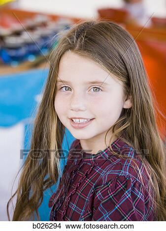 Picture - girl at a carnival. Fotosearch