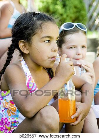 girl drinking a soda View Large Photo Image Stock Photo - girl drinking a soda. Fotosearch