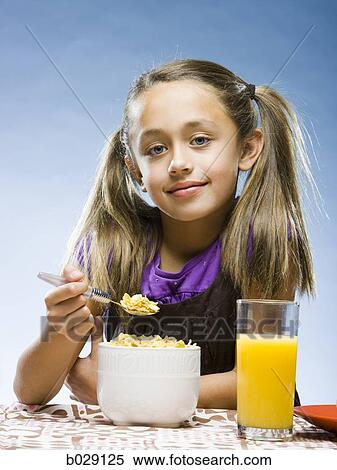 girl eating breakfast View Large Photo Image Stock Photography - girl eating breakfast. Fotosearch