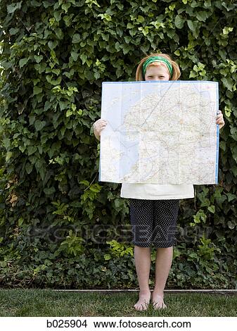 girl holding a map View Large Photo Image Picture - girl holding a map. Fotosearch