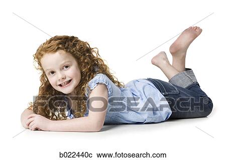 Stock Image - girl in a blue shirt. Fotosearch