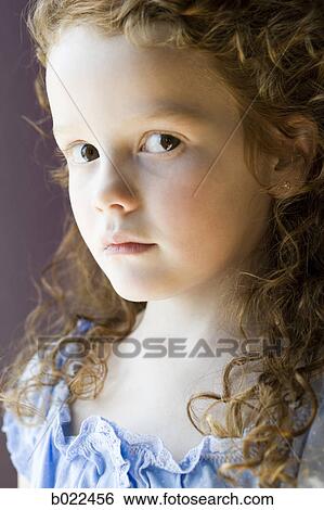 girl in a blue shirt View Large Photo Image Stock Photograph - girl in a blue shirt. Fotosearch