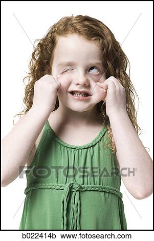 Stock Image - girl in a green dress. Fotosearch