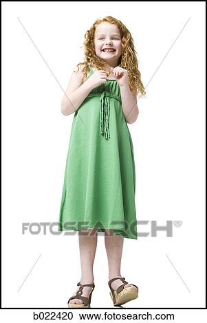 girl in a green dress View Large Photo Image Stock Image - girl in a green dress. Fotosearch