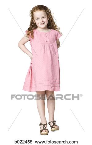 girl in a pink dress View Large Photo Image Stock Photo - girl in a pink dress. Fotosearch
