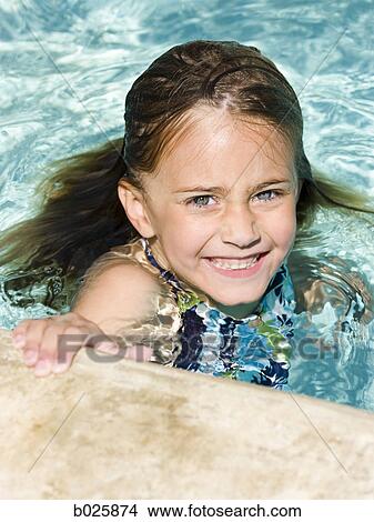 girl in a swimming pool View Large Photo Image Picture - girl in a swimming pool. Fotosearch