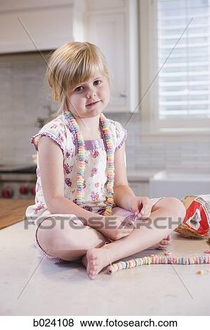 girl making crafts in the kitchen View Large Photo Image Stock Photo - girl making crafts in the kitchen. Fotosearch
