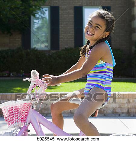 girl riding her bike View Large Photo Image Stock Photography - girl riding her bike. Fotosearch