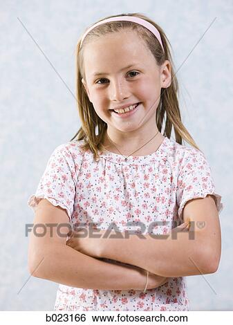 girl with arms folded View Large Photo Image Stock Photograph - girl with arms folded. Fotosearch