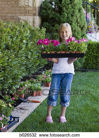 girl working in the garden View Large Photo Image Stock Image - girl working in the garden. Fotosearch