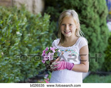 girl working in the garden View Large Photo Image Stock Photography - girl working in the garden. Fotosearch