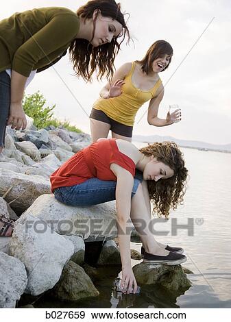 girlfriends by the lake View Large Photo Image Stock Photo - girlfriends by the lake. Fotosearch