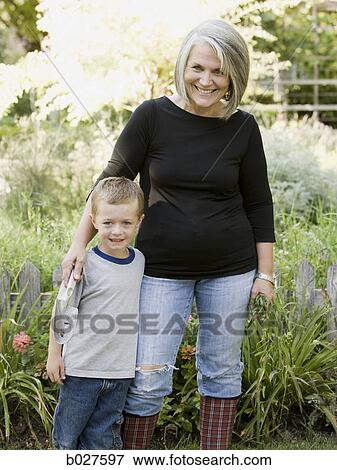 grandmother and grandson in the garden View Large Photo Image Stock Photo - grandmother and grandson in the garden. Fotosearch