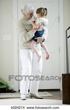 grandmother holding granddaughter View Large Photo Image Picture - grandmother holding granddaughter. Fotosearch