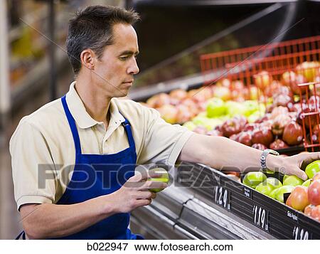 grocery clerk stock photo produce clerk