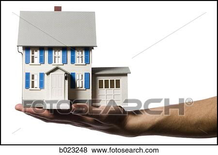 hand holding a house View Large Photo Image Stock Photo - hand holding a house. Fotosearch