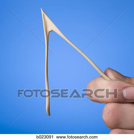 hand holding a wishbone View Large Photo Image Stock Image - hand holding a wishbone. Fotosearch
