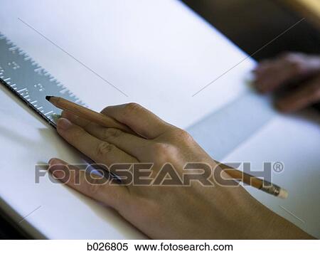 hand using a square on a drafting table View Large Photo Image Stock Photography - hand using a square on a drafting table. Fotosearch