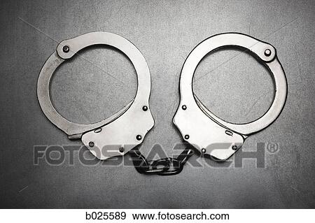 Stock Photo - handcuffs. Fotosearch