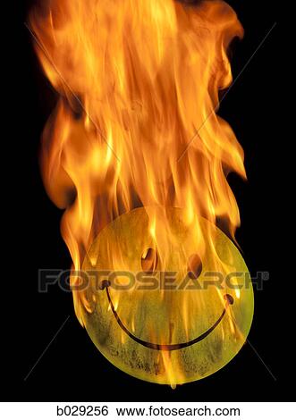 Stock Photograph - happy face on fire. Fotosearch
