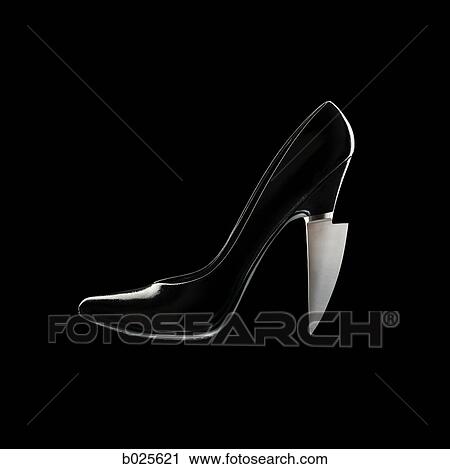 Stock Image - high heel with a kife blade for a heel. Fotosearch