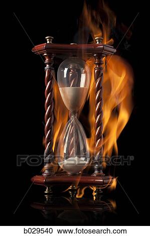 hourglass on fire View Large Photo Image Stock Image - hourglass on fire. Fotosearch