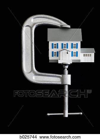 house in a clamp View Large Photo Image Picture - house in a clamp. Fotosearch