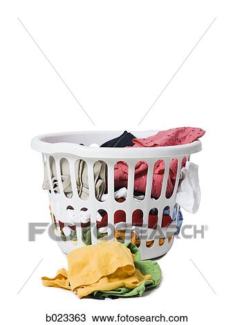 laundry basket full of clothes View Large Photo Image Stock Image - laundry basket full of clothes. Fotosearch